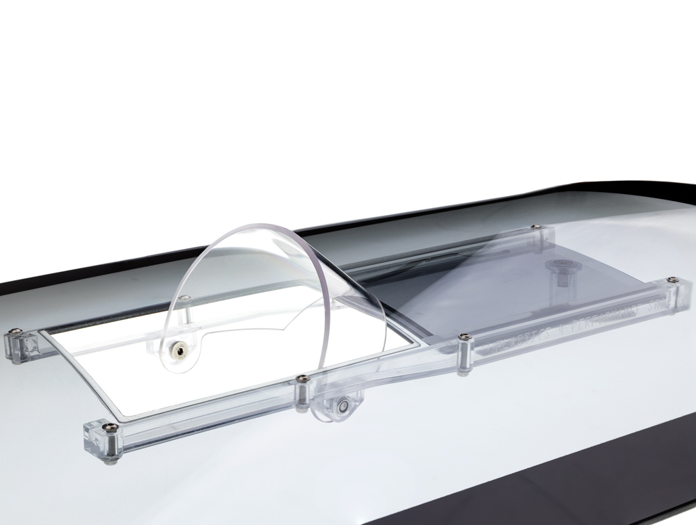 A window slider kit with slider scoop fitted to a Polycarbonate window.